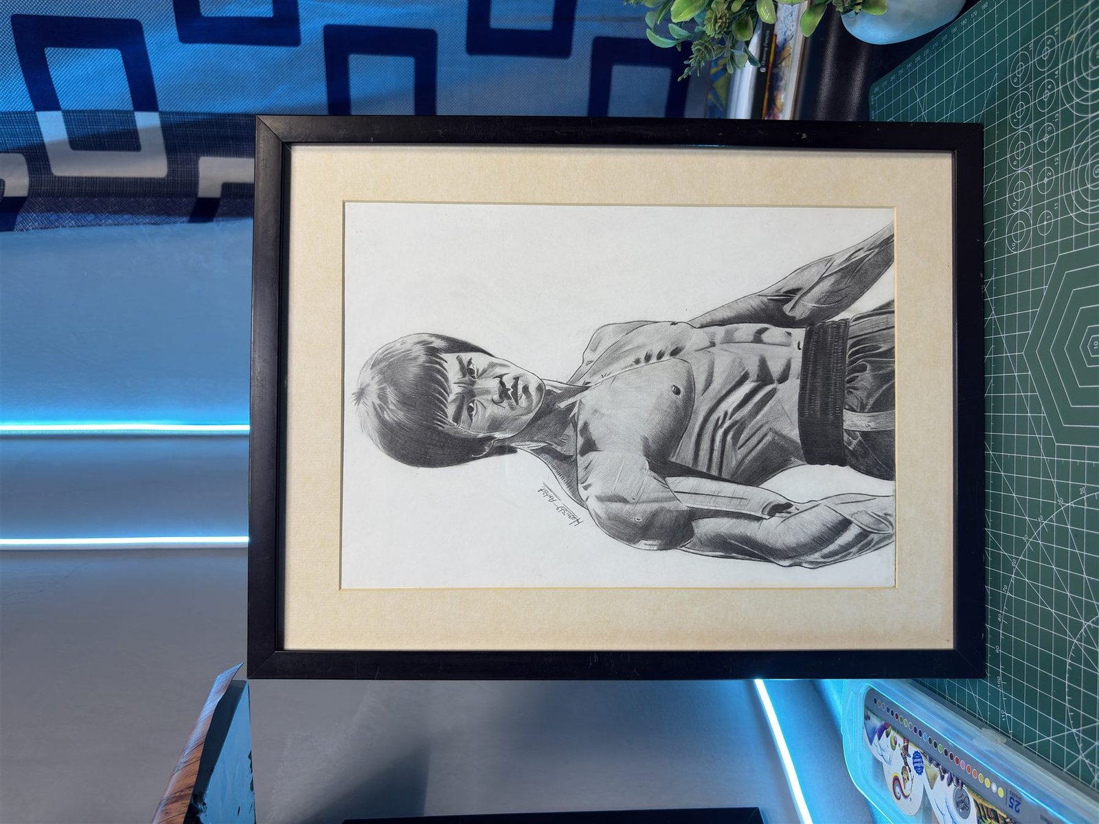 Framed pencil and charcoal portrait inspired by martial arts cinema